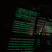 A panoramic view of a sprawling cryptocurrency mining farm filled with racks of mining rigs
